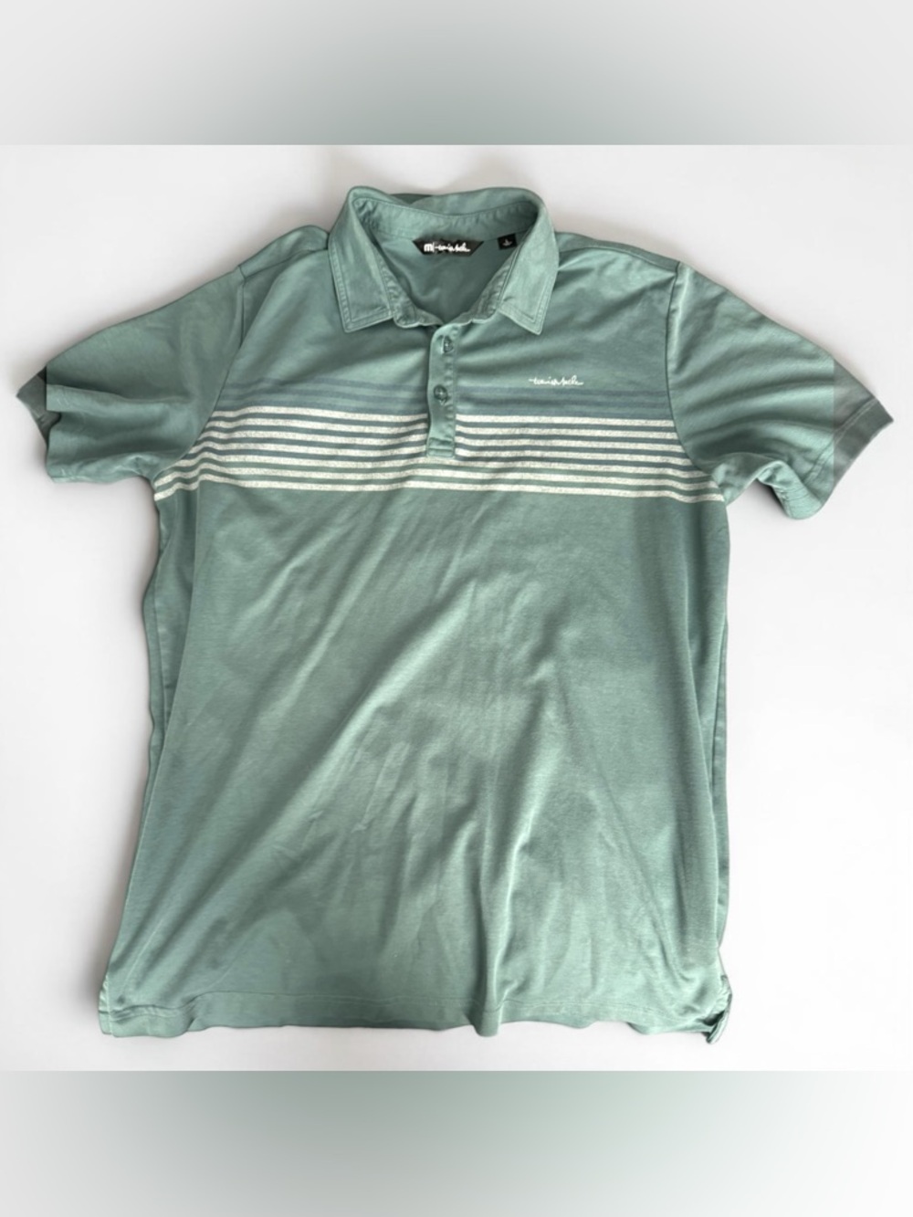 Travis Mathew Men’s Sage Green Polo with White Chest Stripes